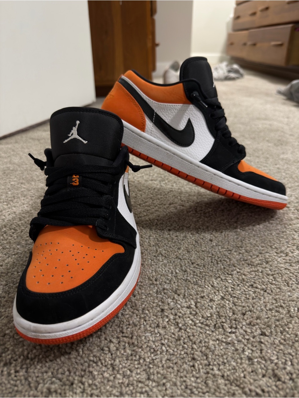 Jordan Low Top Sneakers in Orange, Black & White